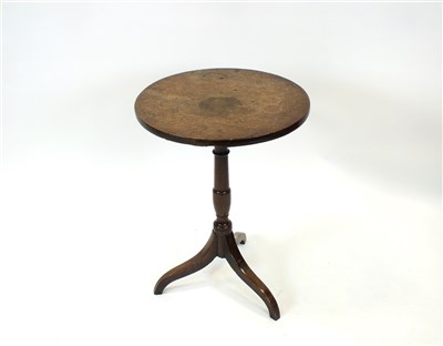 Lot 797 - A small George III oak snap top occasional table