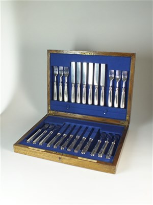 Lot 199 - A cased set of twelve silver knives and forks