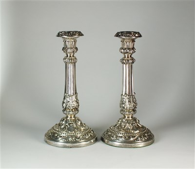 Lot 194 - A pair of George IV silver mounted candlesticks