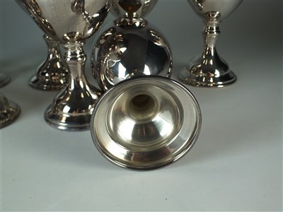 Lot 213 - A set of eight silver goblets