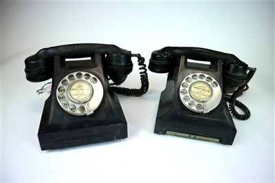 Lot 604 - Two early 20th century black bakelite telephones