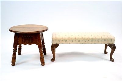Lot 850 - An old English style oak occasional table and an
upholstered foot stool
