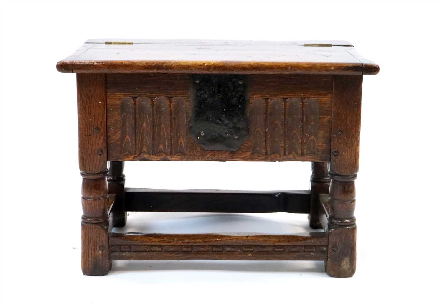 Lot 976 - A small old English style country oak box stool