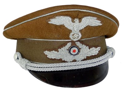 Lot 597 - A Diplomatic Eastern German Official’s visor cap - possibly reproduction