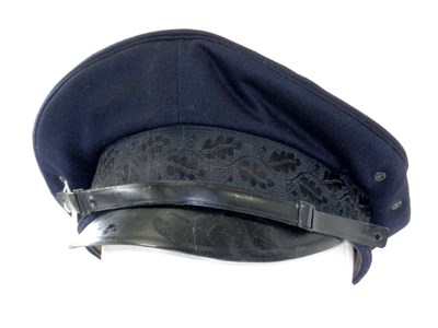 Lot 411 - A D.A.F visor cap lacking insignia