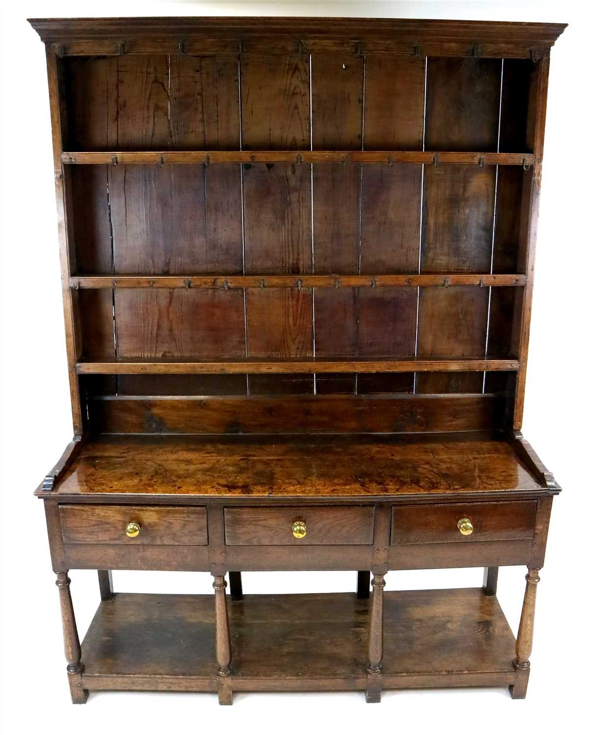Lot 815 - A George III country oak dresser