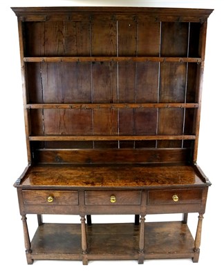 Lot 815 - A George III country oak dresser