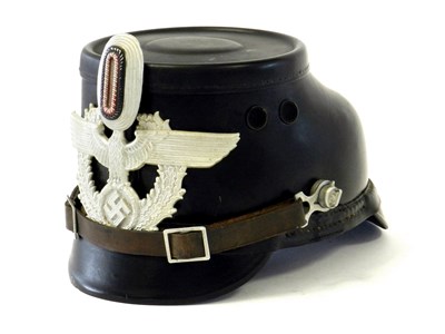 Lot 533 - A German Third Reich City Police Schutzpolizei EM/NCO Shako