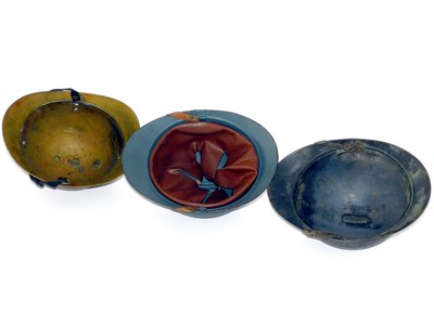 Lot 489 - Three WW1 M15 ‘Adrian’ helmets