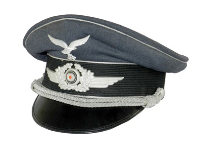 Lot 504 - A German Third Reich Luftwaffe Officer’s Visor cap by Wilhelm Holters