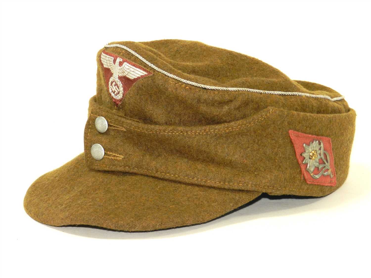 Lot 513 - A German Third Reich SA M43 Field/Ski cap