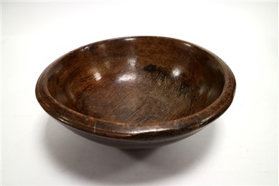 Lot 362 - A Victorian or earlier turned treen dairy bowl