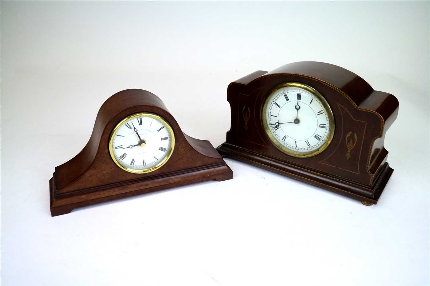 Lot 705 - An Edwardian mahogany cased mantle clock and a reproduction mantle clock