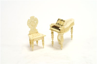 Lot 677 - Ivory piano and chair (repaired)