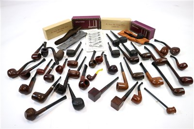 Lot 582 - A collection of seemingly unsmoked mid 20th century tobacco pipes