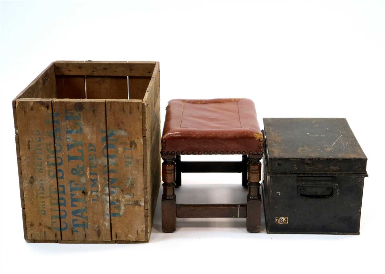 Lot 982 - A leather stool, strong box and a 20th century pine sugar crate