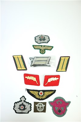 Lot 493 - A selection of German WW2 and later cloth insignia including a pair of Indanturrat Army Administration shoulder tabs