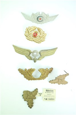 Lot 297 - An assorted collection of German Third Reich wreaths and cockades