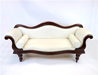 Lot 874 - A Victorian mahogany serpentine framed upholstered sofa