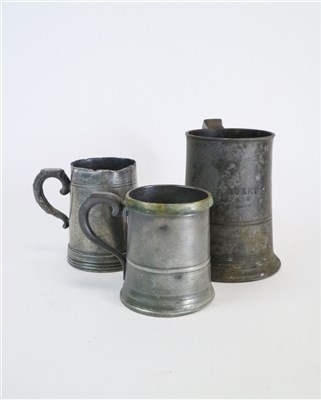 Lot 435 - A collection of fifteen antique pewter tankards