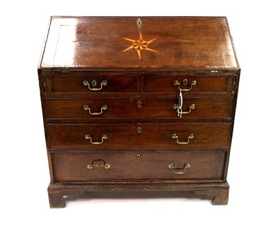 Lot 956 - A George III country oak bureau