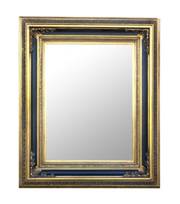 Lot 825 - A very large decorative reproduction gilt framed wall mirror