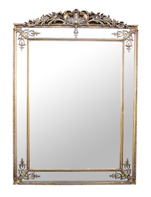 Lot 888 - A very large decorative reproduction gilt framed wall mirror