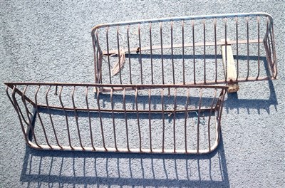Lot 777 - Two weathered iron farm wall hanging hay feeders