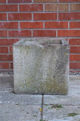 Lot 604 - A weathered cut limestone planter of squared form