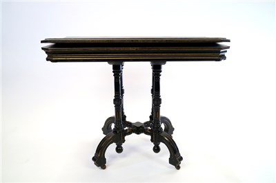 Lot 447 - Ebony fold over card table