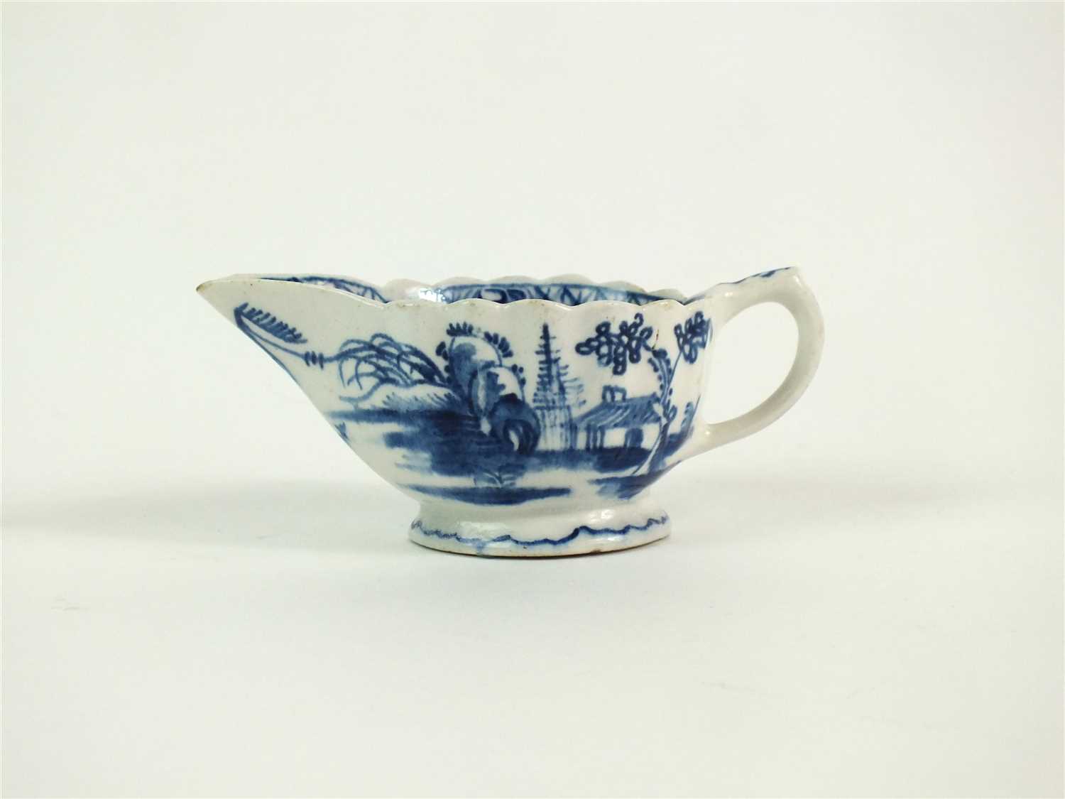 Lot 42 - A Bow 'Desirable Residence' pattern creamboat
