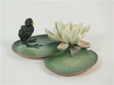 Lot 66 - A Royal Worcester model of a Moorhen Chick and a Water Lily