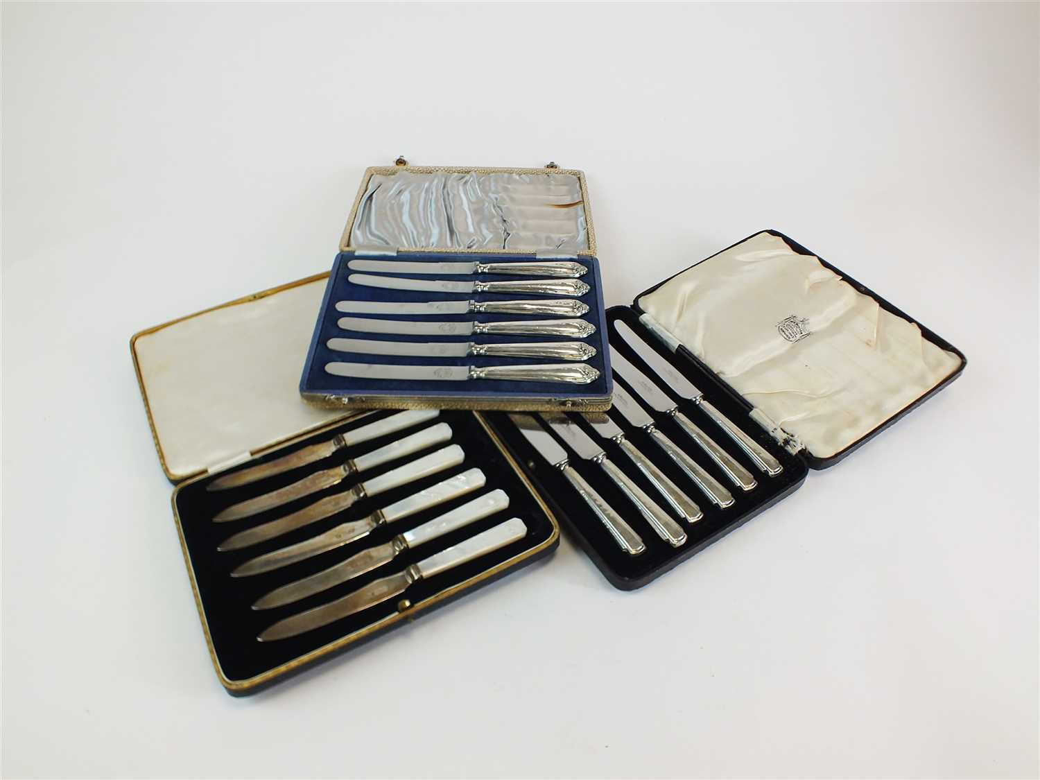 Lot 126 - Three cased sets of knives