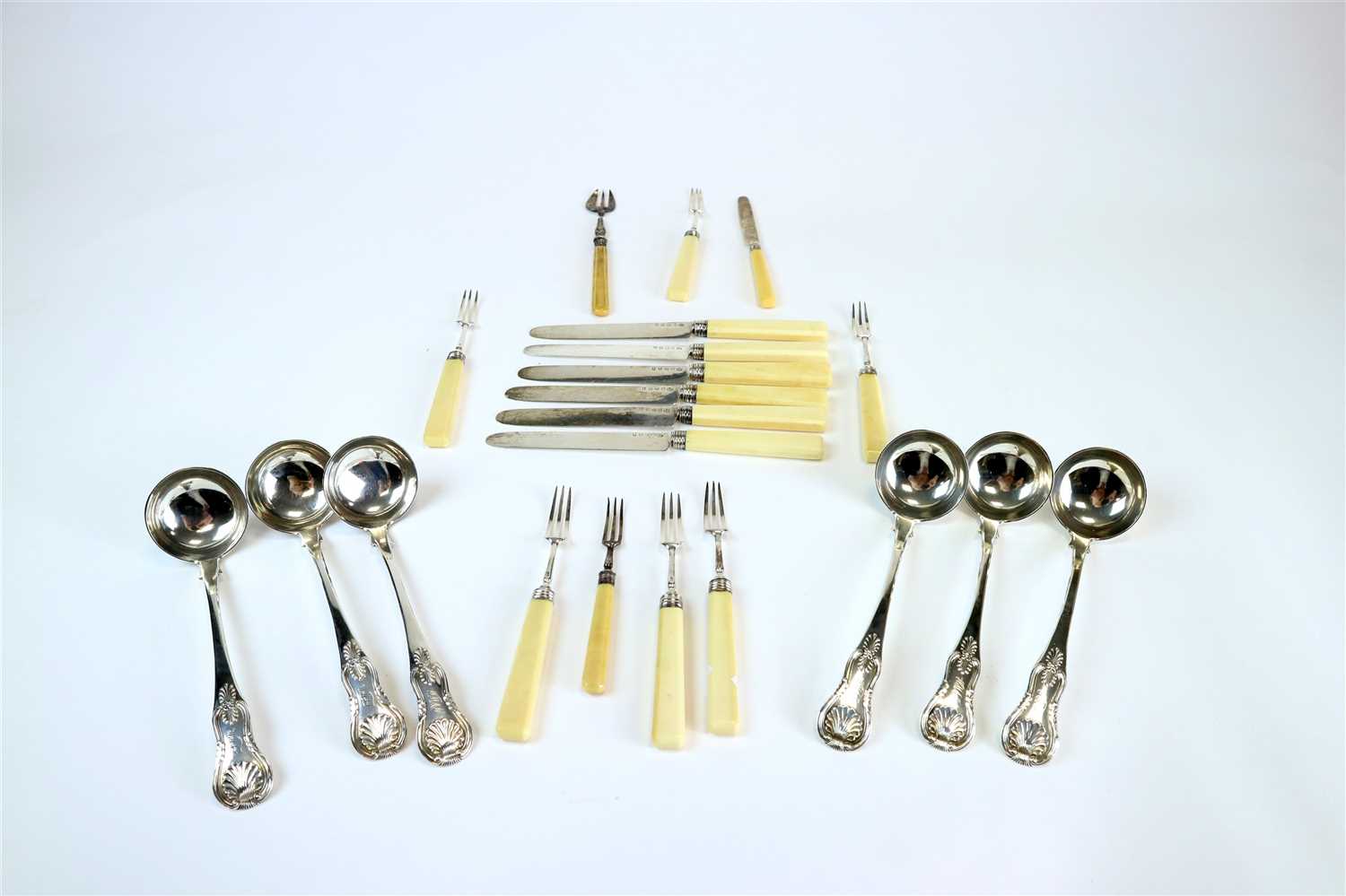 Lot 144 - A set of silver ladles and ivory handled knives and forks