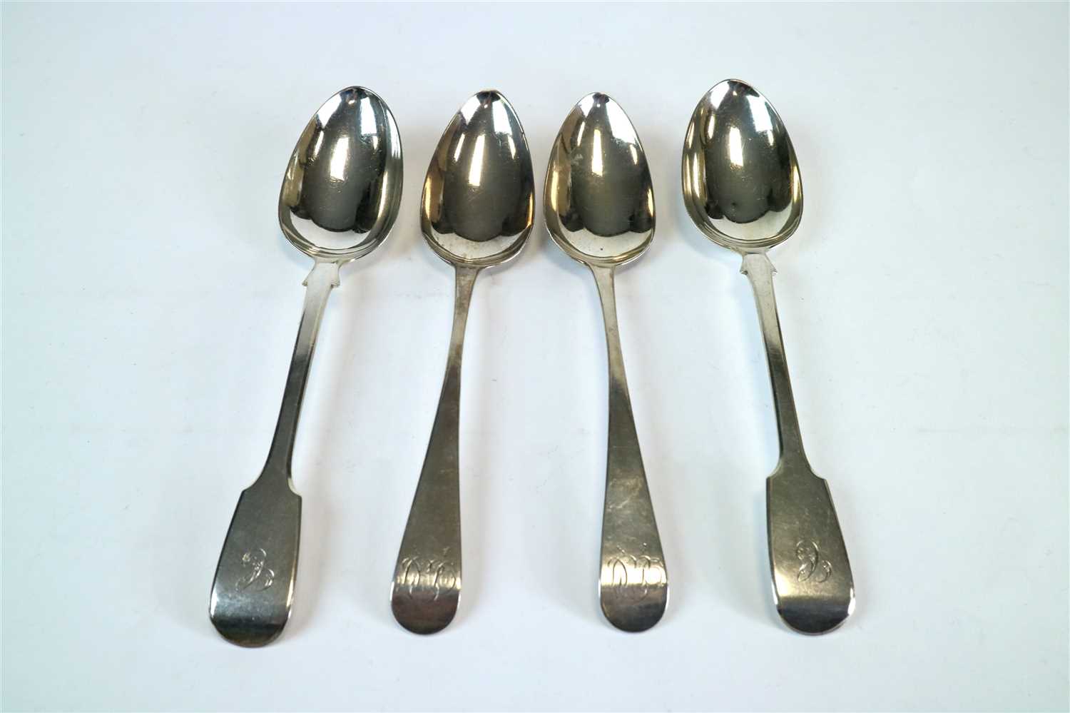 Lot 145 - Two pairs of silver serving spoons