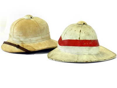Lot 427 - A red and white painted Canadian Wolseley pattern pith/sun helmet