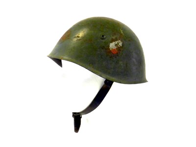 Lot 483 - An Italian M33 steel helmet