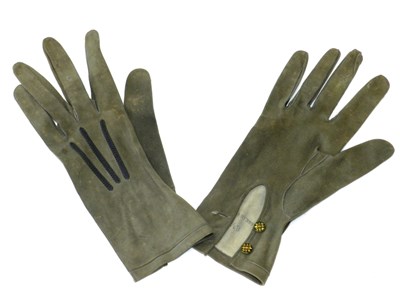 Lot 437 - A pair of 1930s grey-green suede gloves by Girault of France