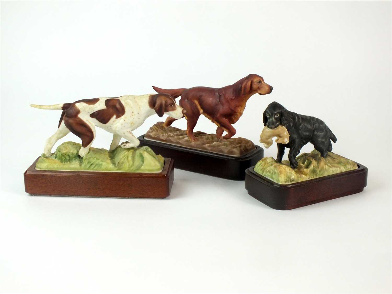 Lot 82 - Three Royal Worcester models of Sporting Dogs