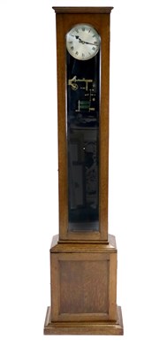 Lot 587 - An oak cased Synchronome electric clock