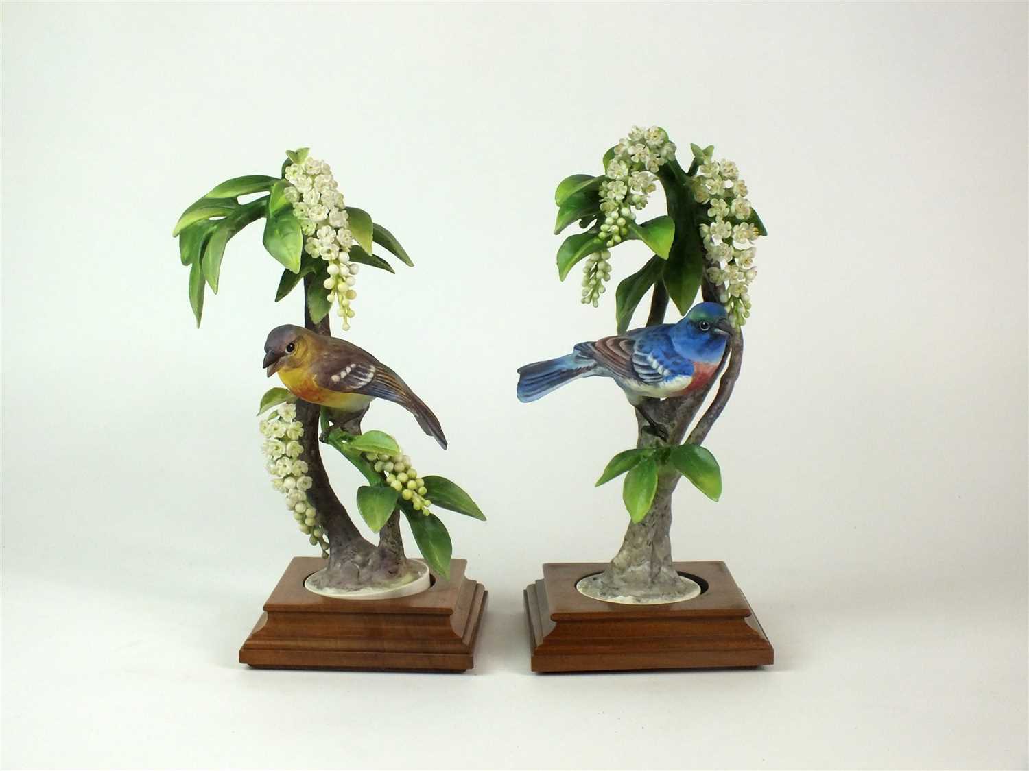 Lot 88 - A pair of Royal Worcester models of Lazuli Bunting on Choke Cherry