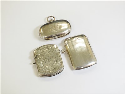 Lot 53 - Two silver vesta cases and a sovereign case