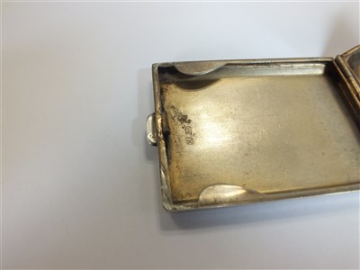Lot 58 - Two silver match cases and a folding knife