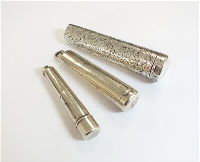 Lot 60 - Three cheroot cases and two cheroots
