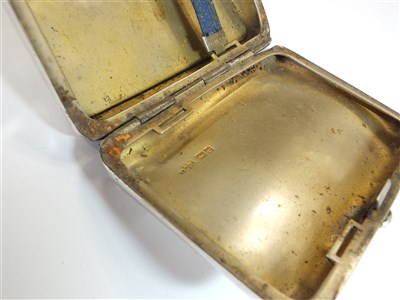 Lot 61 - A silver cigarette case and two vesta cases