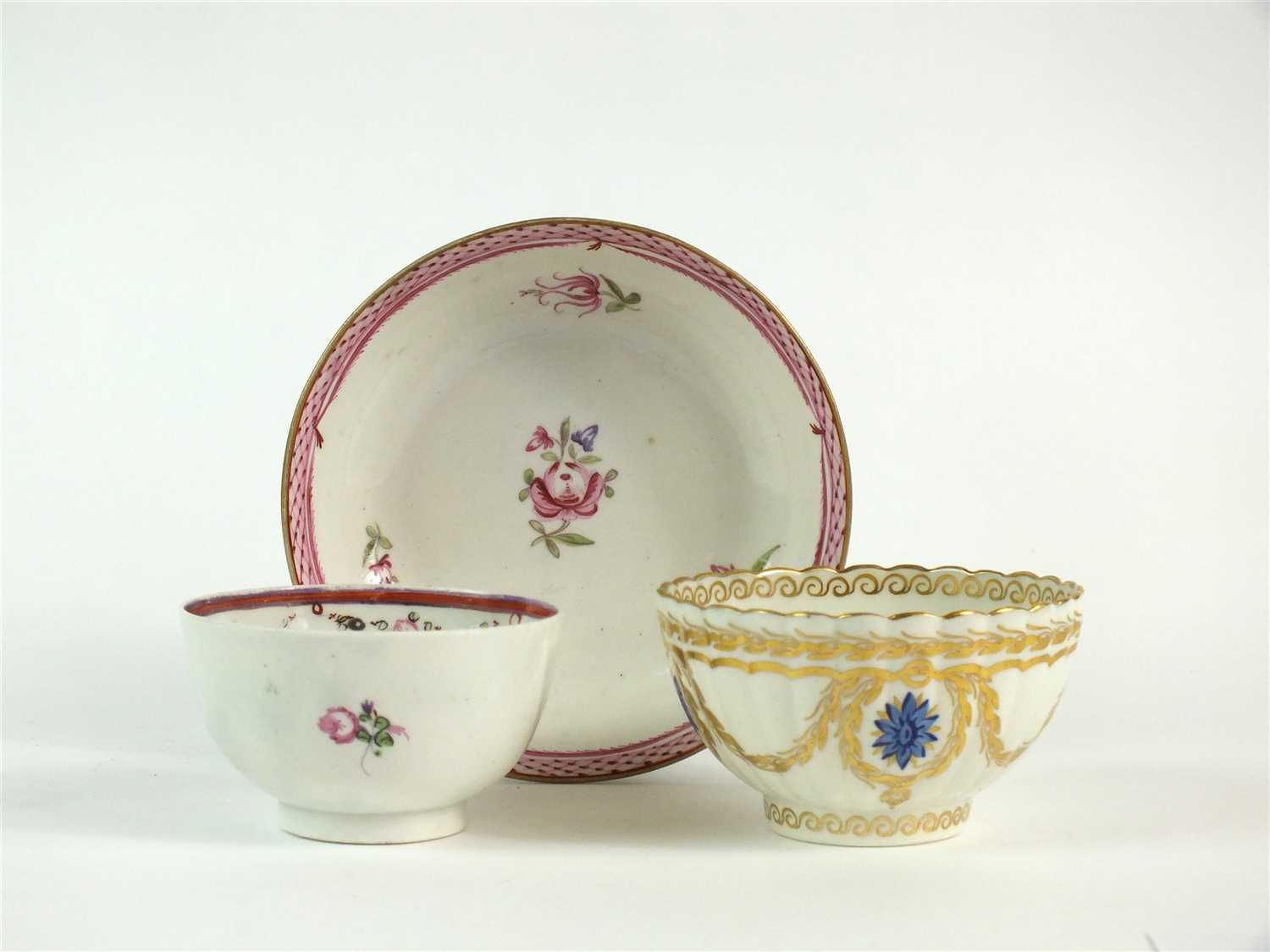 Lot 59 - A Caughley polychrome tea bowl and a further polychrome tea bowl and saucer