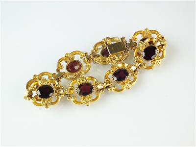 Lot 255 - A 9ct gold 19th century style garnet bracelet