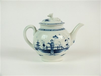 Lot 5 - A rare Caughley 'Girl with Parasol' teapot and cover