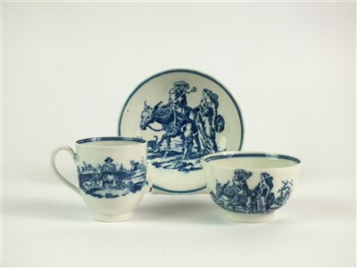Lot 6 - A rare Caughley 'Travellers' trio of coffee cup, tea bowl and saucer