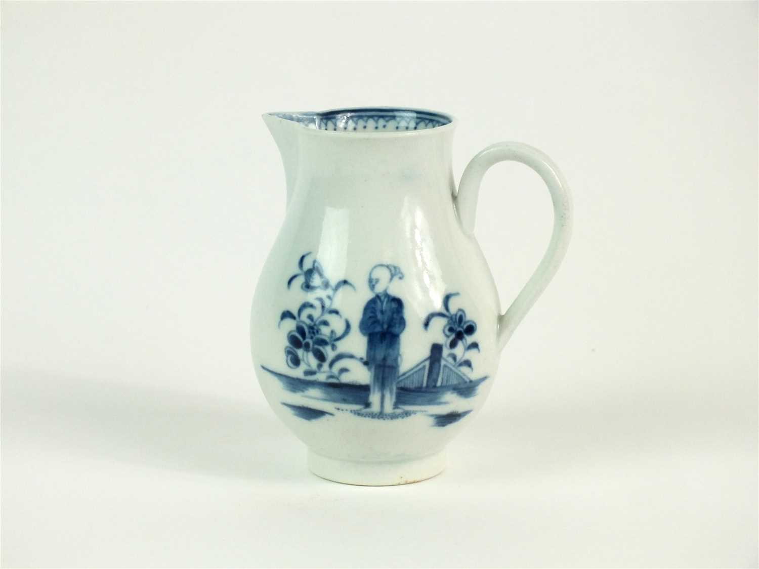 Lot 11 - A Caughley porcelain 'Waiting Chinaman' sparrow-beak jug